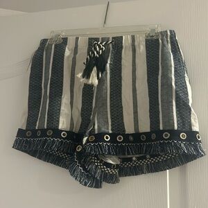 white and navy blue flowy shorts